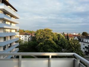 a balcony with a view of a city at Apartment Frankfurt City View - Oberursel in Oberursel