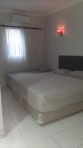 Foto da galeria de STUDIO VERANEIO GUARUJÁ no Guarujá