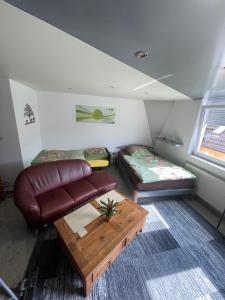 Posezení v ubytování 1 Zimmer Ferienwohnung 30 qm