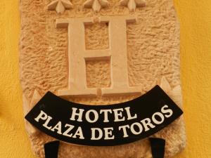 Ein Zertifikat, Auszeichnung, Logo oder anderes Dokument, das in der Unterkunft Plaza de Toros ausgestellt ist