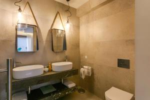 A bathroom at Villa Mariba Blue by Villa Plus