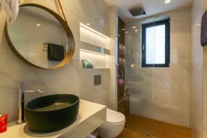 A bathroom at Villa Mariba Blue by Villa Plus