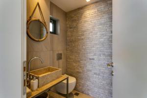A bathroom at Villa Mariba Blue by Villa Plus