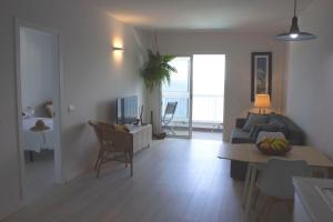TV a/nebo společenská místnost v ubytování Apartamento mágico con vistas al mar