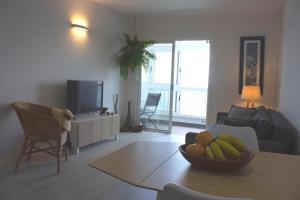 TV a/nebo společenská místnost v ubytování Apartamento mágico con vistas al mar