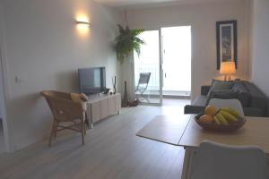 TV a/nebo společenská místnost v ubytování Apartamento mágico con vistas al mar