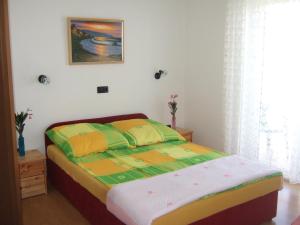 Кровать или кровати в номере Apartments Bibijana