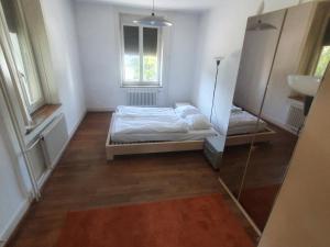 Voodi või voodid majutusasutuse Sonnegg Guest Rooms Inh M Bisegger toas