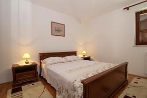 Postel nebo postele na pokoji v ubytování Luna in Marčana (Haus für 4-6 Personen)