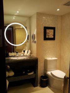 Koupelna v ubytování Xiyuan Hotel