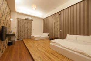 Postel nebo postele na pokoji v ubytování Muho B&B