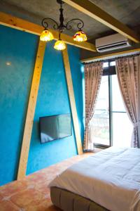 Postel nebo postele na pokoji v ubytování Muho B&B