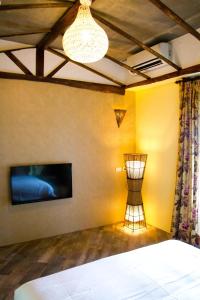 Postel nebo postele na pokoji v ubytování Muho B&B