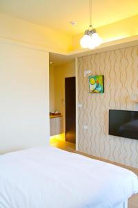 Postel nebo postele na pokoji v ubytování Muho B&B