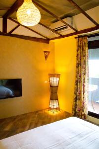 Postel nebo postele na pokoji v ubytování Muho B&B