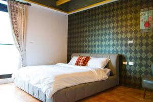 Postel nebo postele na pokoji v ubytování Muho B&B