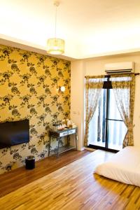 Postel nebo postele na pokoji v ubytování Muho B&B