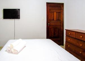 Postel nebo postele na pokoji v ubytování Casa a 140m da Praia do Sul com Wi-Fi em Ilheus BA