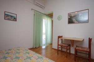 Postel nebo postele na pokoji v ubytování Apartments and rooms with parking space Bozava, Dugi otok - 8100