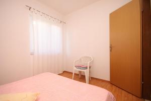 Posteľ alebo postele v izbe v ubytovaní Apartment Preko 8384a