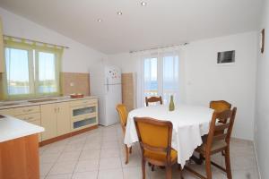 Kuchyň nebo kuchyňský kout v ubytování Apartments by the sea Preko, Ugljan - 8384