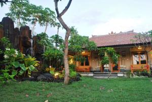Zahrada ubytování Trijaya Guest House Pemuteran