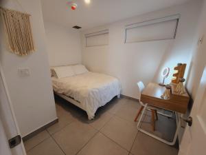 Postel nebo postele na pokoji v ubytování ARUBA DREAM GETAWAY 2BR/2BT OCEAN & POOL VIEW