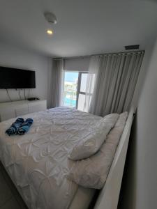 Postel nebo postele na pokoji v ubytování ARUBA DREAM GETAWAY 2BR/2BT OCEAN & POOL VIEW