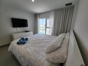 Postel nebo postele na pokoji v ubytování ARUBA DREAM GETAWAY 2BR/2BT OCEAN & POOL VIEW