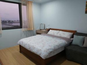 Postel nebo postele na pokoji v ubytování Chin-Lan B&B