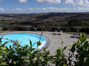 The swimming pool at or close to Belvilla by OYO Tulipano