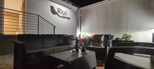 Posezení v ubytování Rigó Apartman