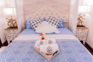 Postel nebo postele na pokoji v ubytování Ruanmata Homestay