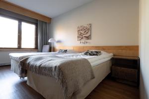 Postel nebo postele na pokoji v ubytování Lapland Hotels Hetta