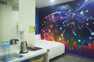 Postel nebo postele na pokoji v ubytování 柜富賓王旅店-台北館 Giant Rich King Plaza Hotel