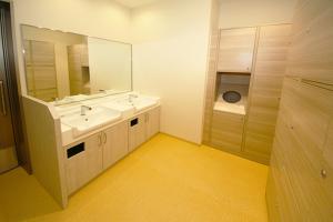 Ένα μπάνιο στο Kuretake Inn Premium Shizuoka Annex