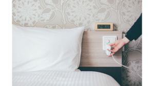Ένα ή περισσότερα κρεβάτια σε δωμάτιο στο Kuretake Inn Premium Shizuoka Annex