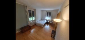 Voodi või voodid majutusasutuse Sonnegg Guest Rooms Inh M Bisegger toas