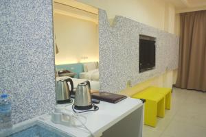 Postel nebo postele na pokoji v ubytování 柜富賓王旅店-台北館 Giant Rich King Plaza Hotel