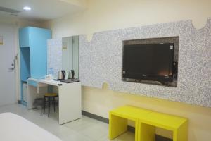TV a/nebo společenská místnost v ubytování 柜富賓王旅店-台北館 Giant Rich King Plaza Hotel