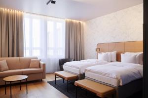 Postel nebo postele na pokoji v ubytování Solo Sokos Hotel Helsinki