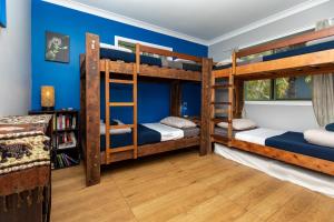 Postel nebo postele na pokoji v ubytování KiteSurf 1770 Beach House