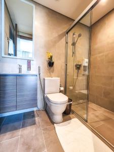 a bathroom with a toilet and a shower at STAY BY LATINEM Luxury 2BR Holiday Home CV A1409 near Burj Khalifa in Dubai