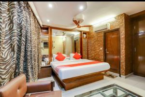 Postel nebo postele na pokoji v ubytování Hotel Roma Deluxe - New Delhi Railway Station