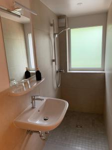 Koupelna v ubytování Smart Stay Rooms Feldkirch