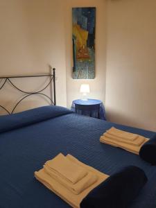A bed or beds in a room at Sole D'oro IUN S4354