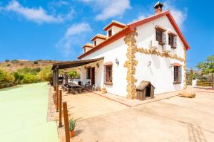una imagen de una casa en Casa Rural Loma El Letrao en Almogía