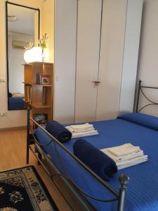 A bed or beds in a room at Sole D'oro IUN S4354