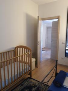 A bed or beds in a room at Sole D'oro IUN S4354