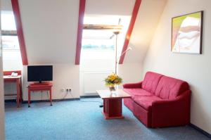 Telewizja i/lub zestaw kina domowego w obiekcie Hotel Allegro Wien